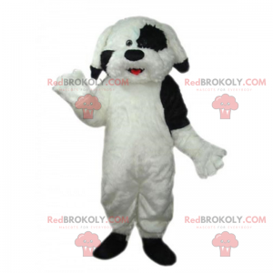 White dog mascot with black spots in the left eye -