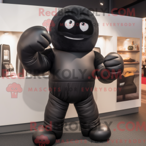 Sort boksehandske maskot...