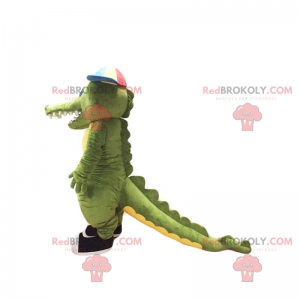 Mascota de cocodrilo con gorra y zapatillas - Redbrokoly.com