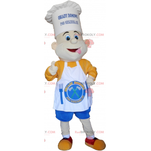 Cozinheiro mascote com um lindo chapéu de chef e um avental -