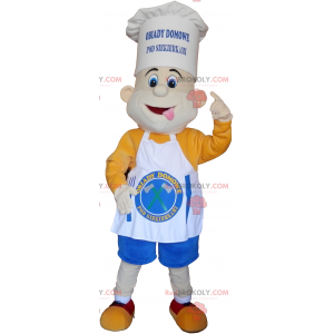 Cozinheiro mascote com um lindo chapéu de chef e um avental -