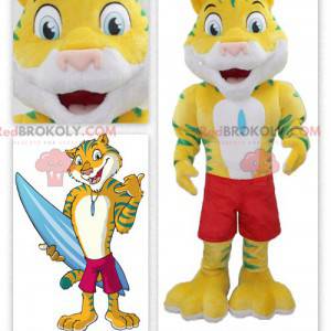 Mascote tigre amarelo e verde com calções de banho -