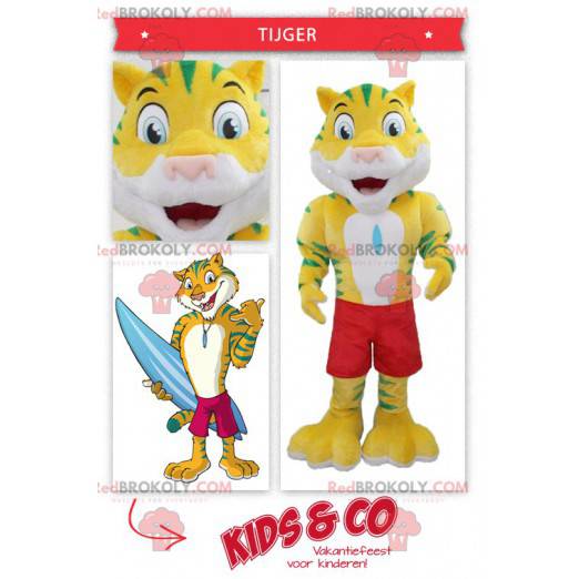 Mascote tigre amarelo e verde com calções de banho -