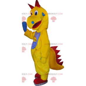 Gelbes Dinosaurier-Maskottchen mit einem blauen Bauch -
