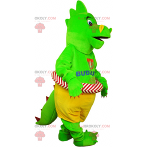 Grön dinosaurmaskot med sin boj - Redbrokoly.com