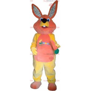 Orange and yellow rabbit mascot with a carrot - Redbrokoly.com