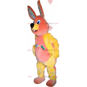 Orange and yellow rabbit mascot with a carrot - Redbrokoly.com