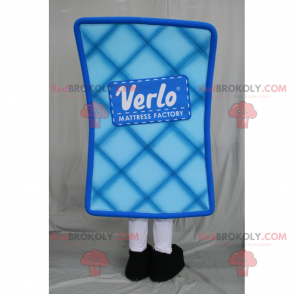 Blue mattress mascot with smiling face - Redbrokoly.com