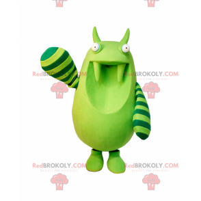 Grünes Monstermaskottchen mit Streifen auf seinen Armen -