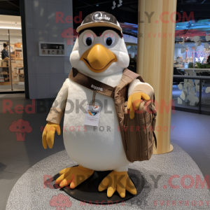Mascotte de pingouin beige...