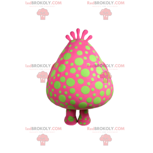 Mascotte de personnage rose avec des taches vertes -