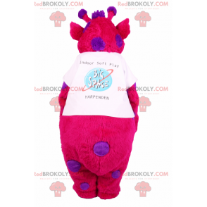 Fuchsia Charakter Maskottchen mit lila Flecken - Redbrokoly.com