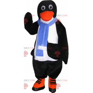 Mascotte del pinguino con una sciarpa blu - Redbrokoly.com