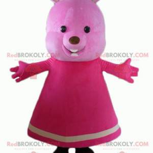 Mascote urso de pelúcia rosa com um vestido - Redbrokoly.com
