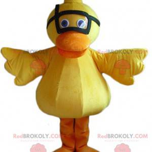 Geel en oranje eend kuiken mascotte met een masker -
