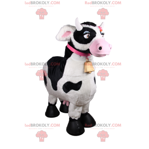 Mascotte de vache avec collier rose et clochette -