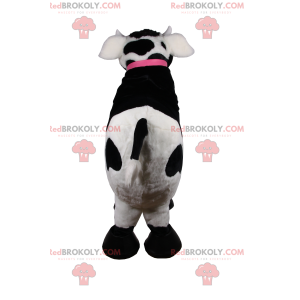 Mascotte de vache avec collier rose et clochette -