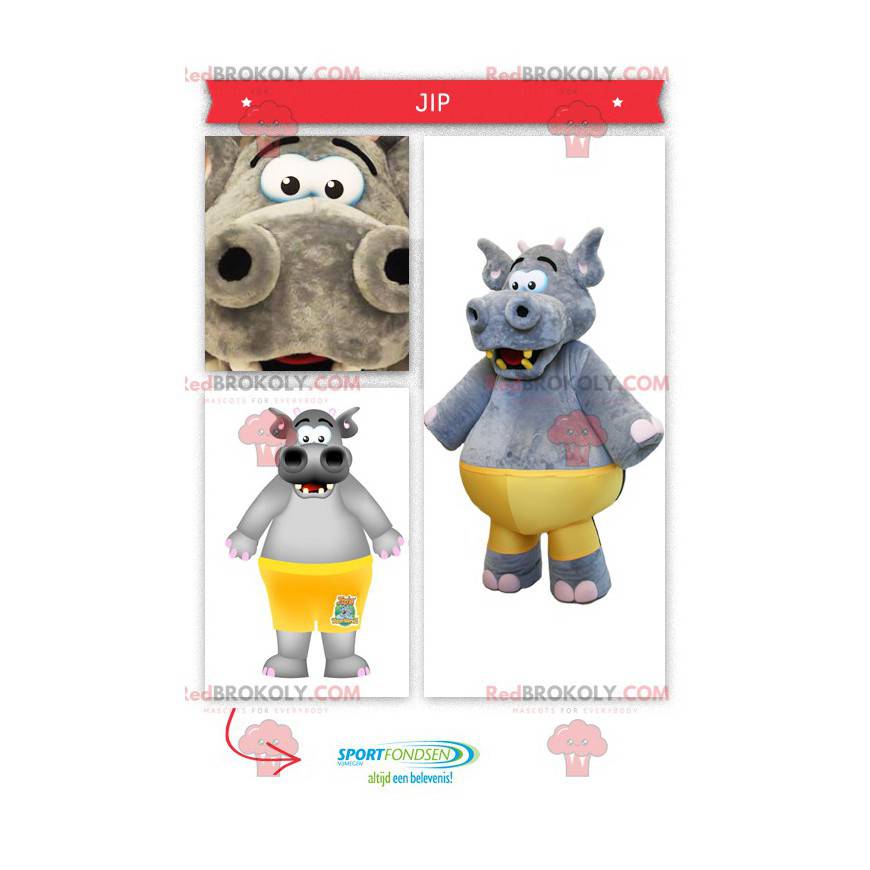 Mascotte de gros hippopotame gris avec un maillot jaune -