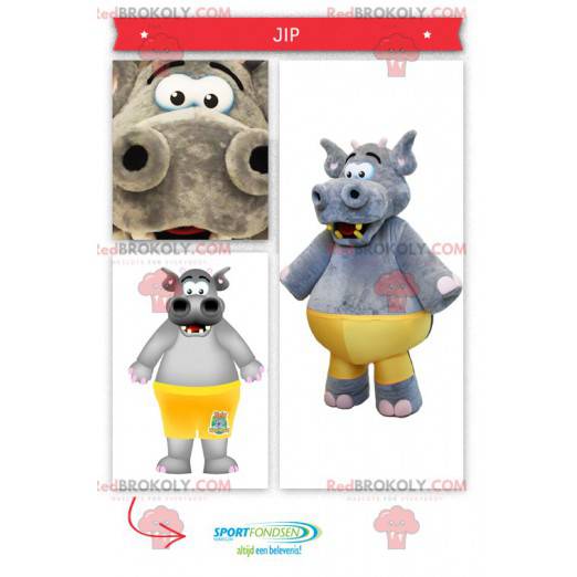 Grote grijze nijlpaard mascotte met een gele trui -