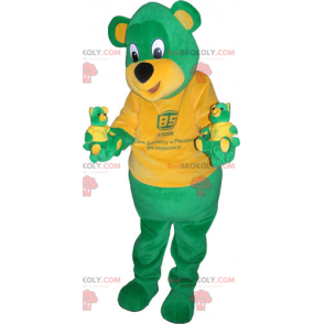 Mascotte d'ours vert avec teeshirt orange - Redbrokoly.com