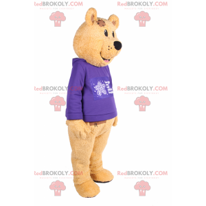 Bärenmaskottchen mit lila Pullover - Redbrokoly.com