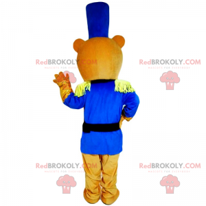 Mascotte dell'orsacchiotto in vestito blu del soldato -