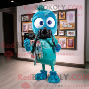 Postava maskota Teal Camera...