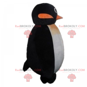 Pequeña mascota pingüino sonriendo - Redbrokoly.com
