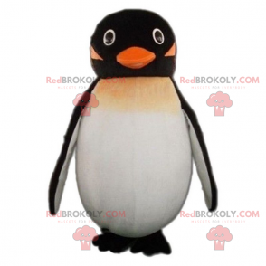 Pequeña mascota pingüino sonriendo - Redbrokoly.com