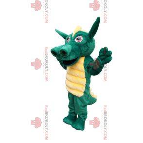 Mascota del dragón verde con una hermosa cresta amarilla