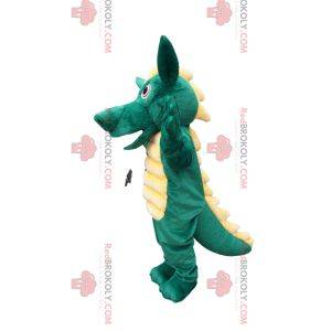 Mascota del dragón verde con una hermosa cresta amarilla