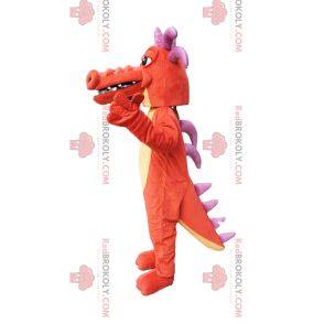 Mascotte de dragon orange, avec des cornes violettes!