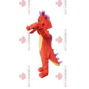 Mascotte de dragon orange, avec des cornes violettes!