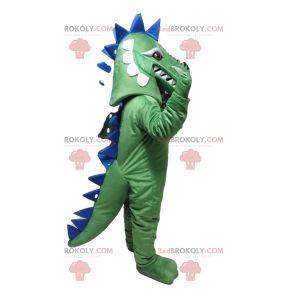 Mascota dinosaurio verde y azul. Disfraz de dinosaurio
