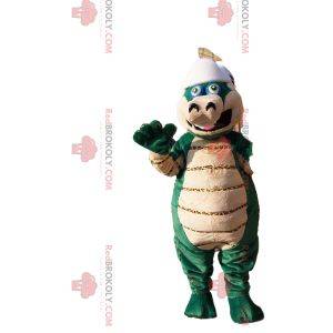 Mascota dinosaurio verde y beige con casco de béisbol