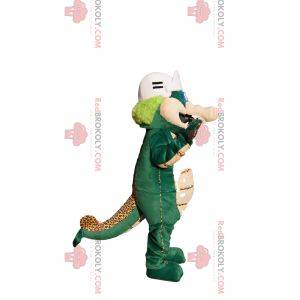 Grünes und beiges Dinosauriermaskottchen mit einem Baseballhelm