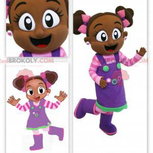 Mascota de niña africana en traje rosa y morado - Redbrokoly.com