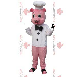 Schweinemaskottchen als Koch verkleidet