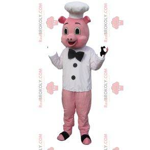 Schweinemaskottchen als Koch verkleidet