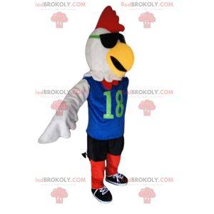 Mascotte de poulet blanc en tenue de sport beu et rouge