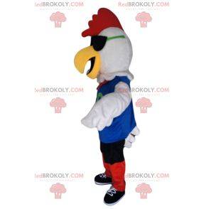 Mascotte pollo bianco in abbigliamento sportivo rosso e blu