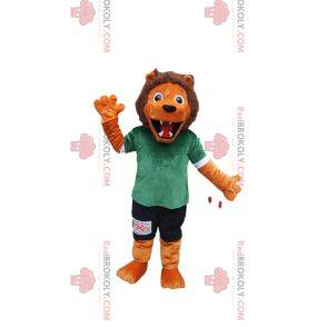 Mascote leão laranja com roupa esportiva verde e preta