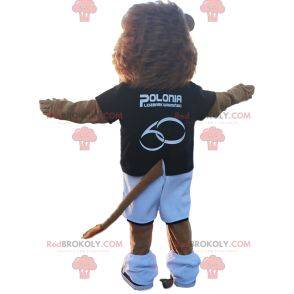 Löwenmaskottchen mit schwarzem Fußballoutfit