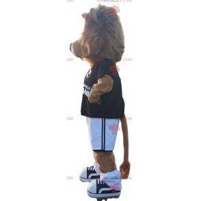 Löwenmaskottchen mit schwarzem Fußballoutfit