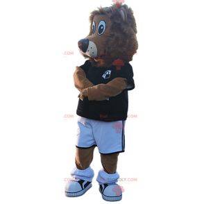 Mascota de león con traje de fútbol negro