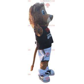 Löwenmaskottchen mit schwarzem Fußballoutfit
