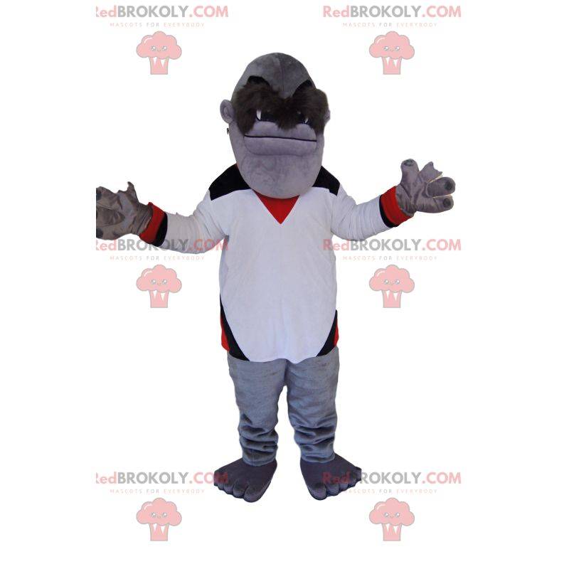 Mascot mono gris con una camiseta blanca. Disfraz de mono