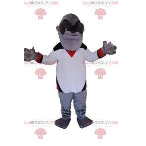Macaco mascote cinza com uma camisa branca. Fantasia de macaco