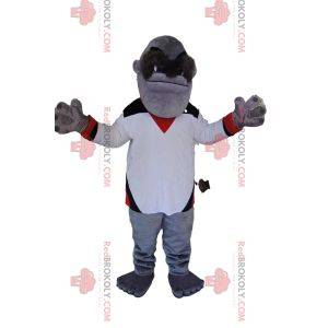 Mascot mono gris con una camiseta blanca. Disfraz de mono