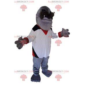 Mascot mono gris con una camiseta blanca. Disfraz de mono